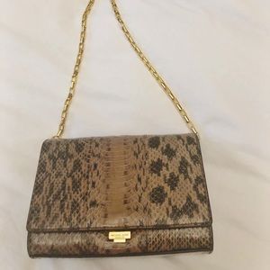 Yasmeen small snakeskin clutch